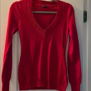 Red v neck express used sweater medium